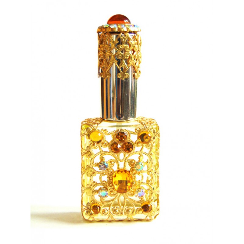 Perfume bottle with spray, decorated cap www.bohemia-glass-products.com